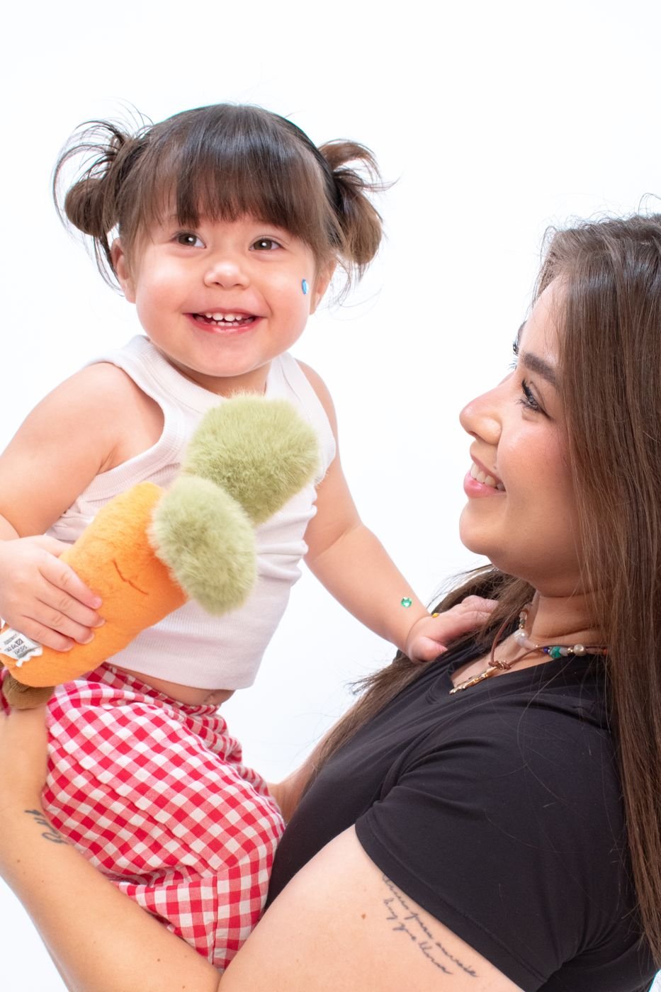 Parent and toddler sharing a warm, affectionate moment